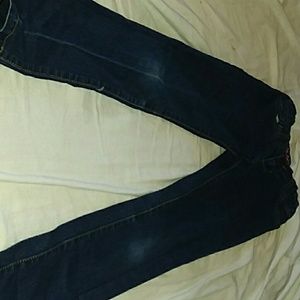 Dark blue skinny jeans for kids.